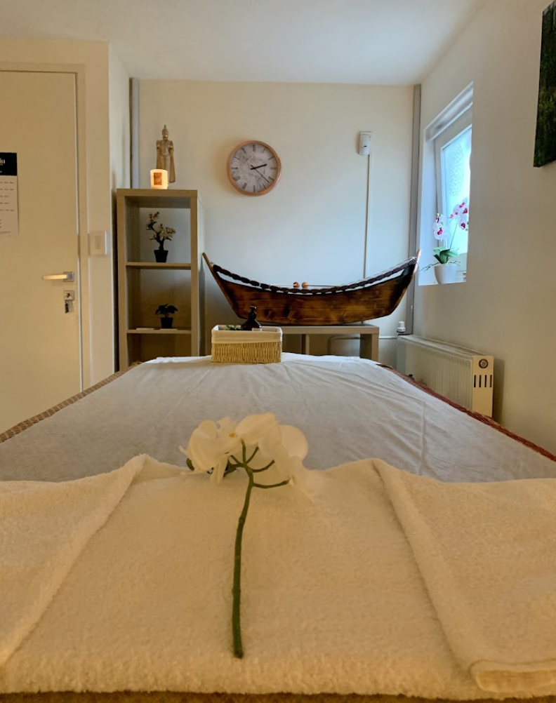 A prepared massage bed at Jusmin Thai Massage